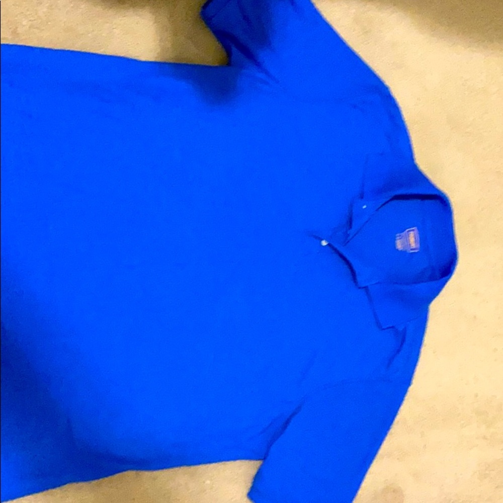 Men’s blue collared shirt.